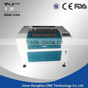 Jinan Donglian 1390 1mm Stainless Steel Laser Cutting Machine With Air Filter for Plastics thumbnail-1
