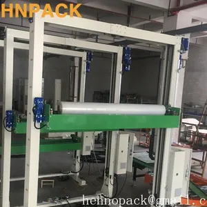 Hennopack Fully Automatic Pass Type Pallet Top Foil Sheet Dispenser Machine thumbnail-1