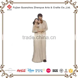 Wood Imitation Polyresin Family Figurine thumbnail-1