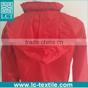 Whosale Cheap Price 190T Nylon Mech Solid Red Promotional Advertising Hooded Foldable Jacket With Heat Transfer Print(LCTN1562) thumbnail-3