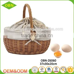 China Wholesale Customized Handmade 100% Natural Antique Wicker Egg Basket With Fabric Cover thumbnail-1