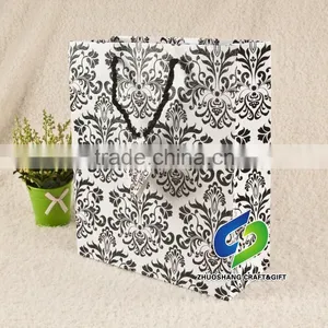 OEM Eco Friendly Custom Logo Printed Cute Shopping Paper Bag thumbnail-1