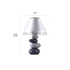 Wholesale Cumulate Stone Shape Ceramic Base Modern Nordic Nightstand Lamps for Hotel Bedside thumbnail-2