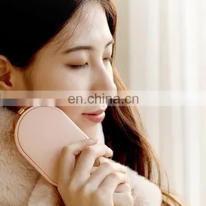 Fast Charging Mini 2 in 1 Pocket Rechargeable Hand Warmer Power Bank With 5000mAh thumbnail-1