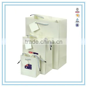 China Custom White Cardboard Paper Bag Shopping Paper Bag Paper Gift Bag With Handles thumbnail-4