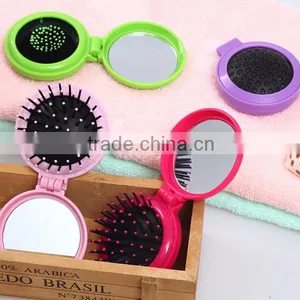 Yiwu Wholesale High Quality Mini Round Shape Folding ABS Head Massage Comb With Mirrow thumbnail-6