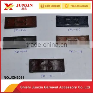Fashion Custom Embossed Leather Label for Garments Made in China thumbnail-1