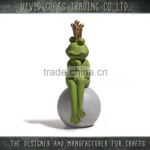 Ceramic or Porcelain Frog With Gold Crown Sitting on Ball for Home and Garden Decoration thumbnail-1