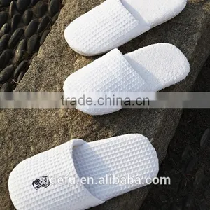 Wholesale Cheap EVA Sole Waffle Hotel Indoor White Slipper With Logo thumbnail-1