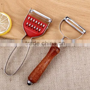 Wooden Handle Round Head Good Quality Stainless Steel Vegetable and Fruit Peeler thumbnail-4