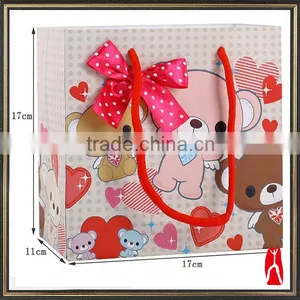 Customized Coated Paper Gift Bags for Children Garments thumbnail-1