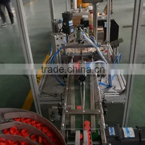 Automatic Plastic Cover Dropping Machine thumbnail-3