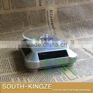 Silver Acrylic Watch/Jewelry/Camera Solar Power Rotating Display Stand thumbnail-3