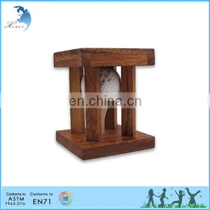Caged Golf Ball - Clever Wooden Brain Teaser Puzzle thumbnail-1