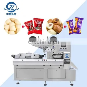 Packaging Machinery Disposable Towel Plastic Bag Automatic Pillow Wrapping Candy Sachet Packing Machine thumbnail-1