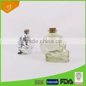 New Products China Made Vodka Bottle,Unique Glass Bottle And Cups With Skull Shape Wine Bottle thumbnail-3