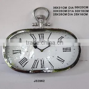 Small Oval Shape Wall Clock Made in Metal in Mirror Polish Finish Other Finishes Available thumbnail-1