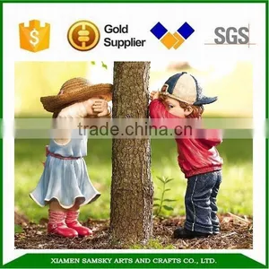 12" Resin Hide and Seek Garden Statue thumbnail-1
