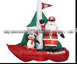 Inflatable Santa on Boat With Penguin thumbnail-1