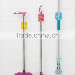 Wholesale Stock Magic Wall Suction Plastic Mop Handle Storage Holder thumbnail-1