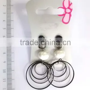 Fancy Silvery Hollow Out Circles Cross Chain Dangle Earrings thumbnail-3