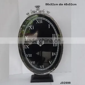 Vertical Oval Shape Steel Metal Table Clock on Base in Mirror Polish Other Finishes Available thumbnail-1