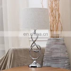 UK Simple Geometric Modeling Custom Iron Base Hotel Desk Light Cheap Silver Nightstand Lamp for Home Table thumbnail-2