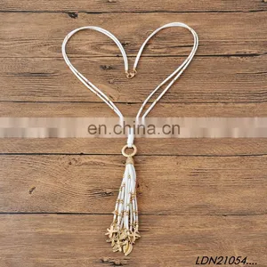 Bohemian White Suede Tassel Pendant Necklace Jewelry With Gold Starfish and Leaves Pendant on Tassel thumbnail-4