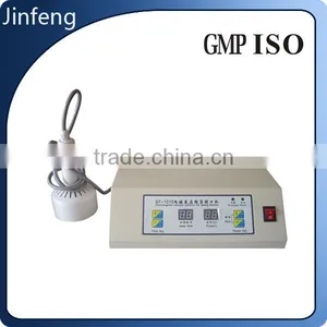 Glass Bottle Plastic Cap Aluminum Foil Sealing Machine thumbnail-1