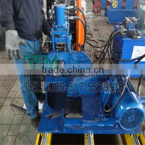 FX Hydraulic Cutting and Punching Shutter Door Roll Forming Machine thumbnail-4