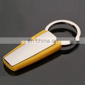 Wholesale Simple Cheap Yellow Color Metal Rubber Keychain With Laser Logo thumbnail-3