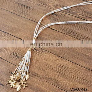 Bohemian White Suede Tassel Pendant Necklace Jewelry With Gold Starfish and Leaves Pendant on Tassel thumbnail-3