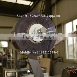 Automatic Small Tea Pouch Packaging Machine With Inner Outer Bag Thread and Tag thumbnail-5