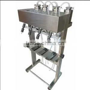 4 Nozzles Perfume Filling Machine thumbnail-1