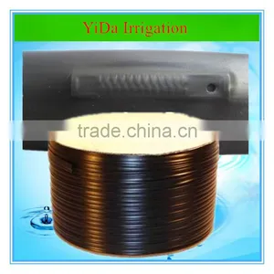 Agriculture Irrigation Drip Tape With Flat Emitter Drippers on Ground thumbnail-1