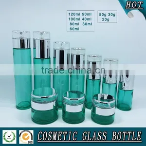 Empty Green Colored Glass Cosmetic Bottle and Cosmetic Glass Cream Jar thumbnail-1