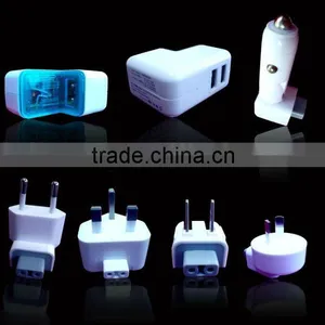 Universal AC Inter-changeable Plug and Car Charger With 2 USB Output thumbnail-1