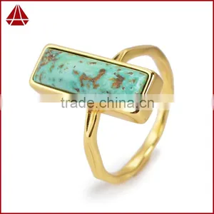 Natural Blue Turquoise Set Into a 18k Gold Bezel thumbnail-1
