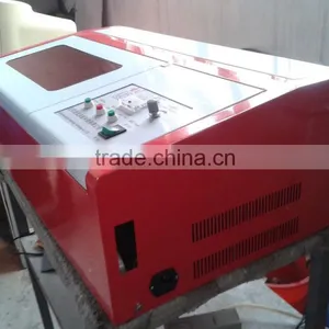 Trade Assurance 300*200mm Water Cooling Cooling Model Co2 Laser Engraving Cutting Machine for Rubber Stamp thumbnail-4