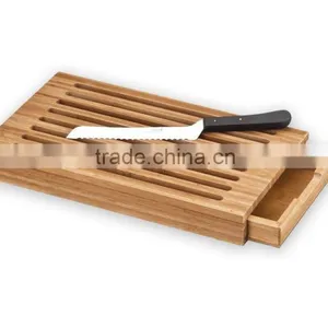 New Design Bamboo Bread Cutting Board With Crumb Catcher Foldaway Bread Plank Hot Sale Bamboo Bread Slicer thumbnail-1