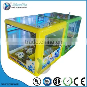 New Design Toy Gift Coin-operated Game Machine for Kids / Magic Doll Cube Mini Toy Crane Machine thumbnail-1