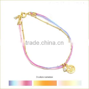 Goldfill Round Smiling Face Charm Bracelet Tiny Rhinestone Charm Bracelet Colorful Rope Gold Chain Layered Bracelet thumbnail-1