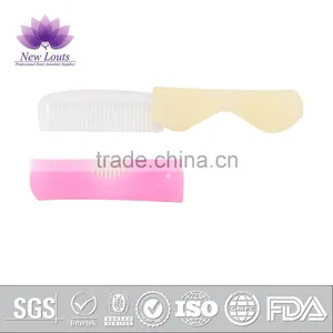Multi-material Plastic Mini Comb and Massage Hairbrush thumbnail-1