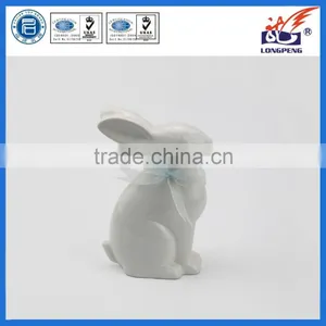 Ceramic Easter Bunny Rabbit Figurine With Blue Bow Ceramic Tabletop Figurine thumbnail-1