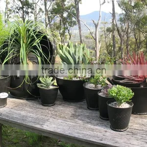 Recycled Rubber Flower Pot Stand thumbnail-1