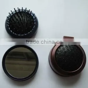 Cosmetic Mirror With Comb thumbnail-1