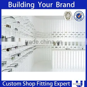 Simple Style White Wall Mouted Sunglasses Optical Store Design thumbnail-1