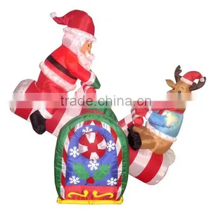 Christmas Decorations Animated Inflatable Santa and Reindeer on a Teeter Totter thumbnail-1