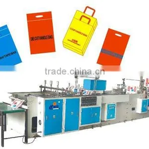 SOFT LOOP HANDLE BAG MAKING MACHINE thumbnail-1