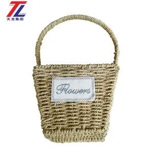 Wholesale Cheap Grass Braid Stitched Natural Gift Straw Basket With Handle thumbnail-2